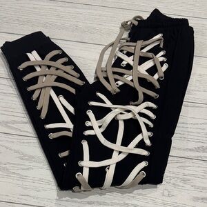 Lace-Up Black Pants with Tan and White Accents